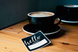 networking event, name badge and coffee, network