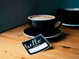 networking event, name badge and coffee, network