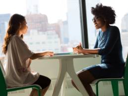 two women having a face-to-face interview, contact, talking