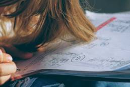young girl doing maths homework