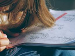 young girl doing maths homework