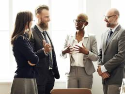 group of diverse people in corporate environment, women in finance