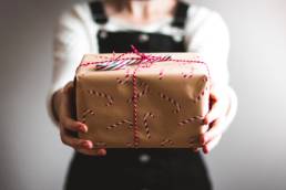 woman giving her Christmas presents