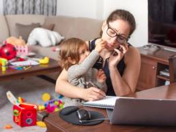 tired, working mum juggling working from home and childcare