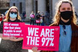 Demonstrators hold up signs at a protest in Dublin to highlight violence against women in the wake of the murder of Sarah Everard, misogyny