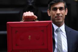 Chancellor of the Exchequer Rishi Sunak hold red box outside 11 Downing Street