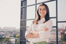 Portrait of nice attractive intelligent stylish cheerful leader company founder folded arms on roof outside outdoor sunny day, The 200 Billion Club