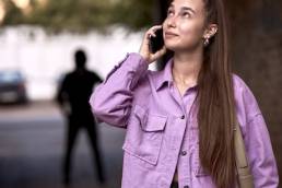 Criminal stalking woman, commiting a crime while victim was walking alone, talking on phone in dark street alley