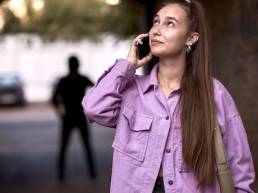 Criminal stalking woman, commiting a crime while victim was walking alone, talking on phone in dark street alley