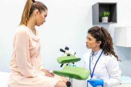 Cervical screening appointment, female doctor and patient during cervical screening