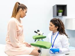 Cervical screening appointment, female doctor and patient during cervical screening