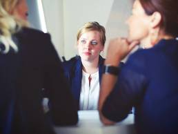 nervous woman in a meeting