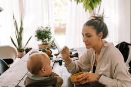 mum feeding child