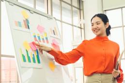 Marketing trends, business woman looking at marketing trends, woman in business