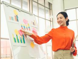 Marketing trends, business woman looking at marketing trends, woman in business