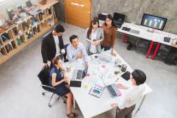 Horizon meeting, group of employees in a work meeting
