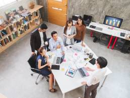 Horizon meeting, group of employees in a work meeting