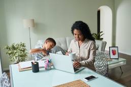 mum with son while working