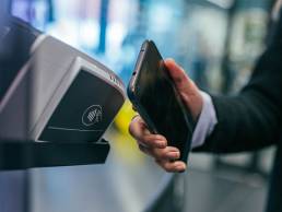 paying-on-phone--0IVop5v4MMU-unsplash