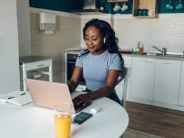 Young african america business woman working from home, female entrepreneur, hybrid working