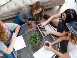Female entrepreneurs, group of female leaders talking while working