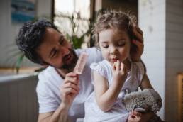 Father taking care of his daughter, paternity leave
