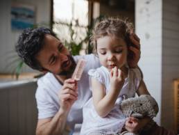 Father taking care of his daughter, paternity leave