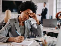 Businesswoman experiencing burnout, mental fatigue