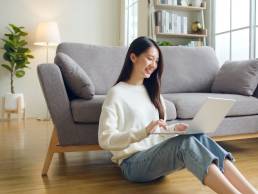 Happy confident businesswoman working from home