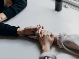compassion, self care, two women holding hands
