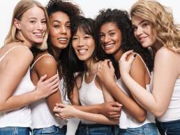 Group of diverse women smiling, international women's day